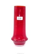 A " Riihimaki" red glass vase designed in 1963 by Tamara Aladin and having a thick curved base,
