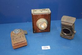 An oil fired Bicycle Lamp with front and rear (clear & red) lenses (cracked) and an early Oak