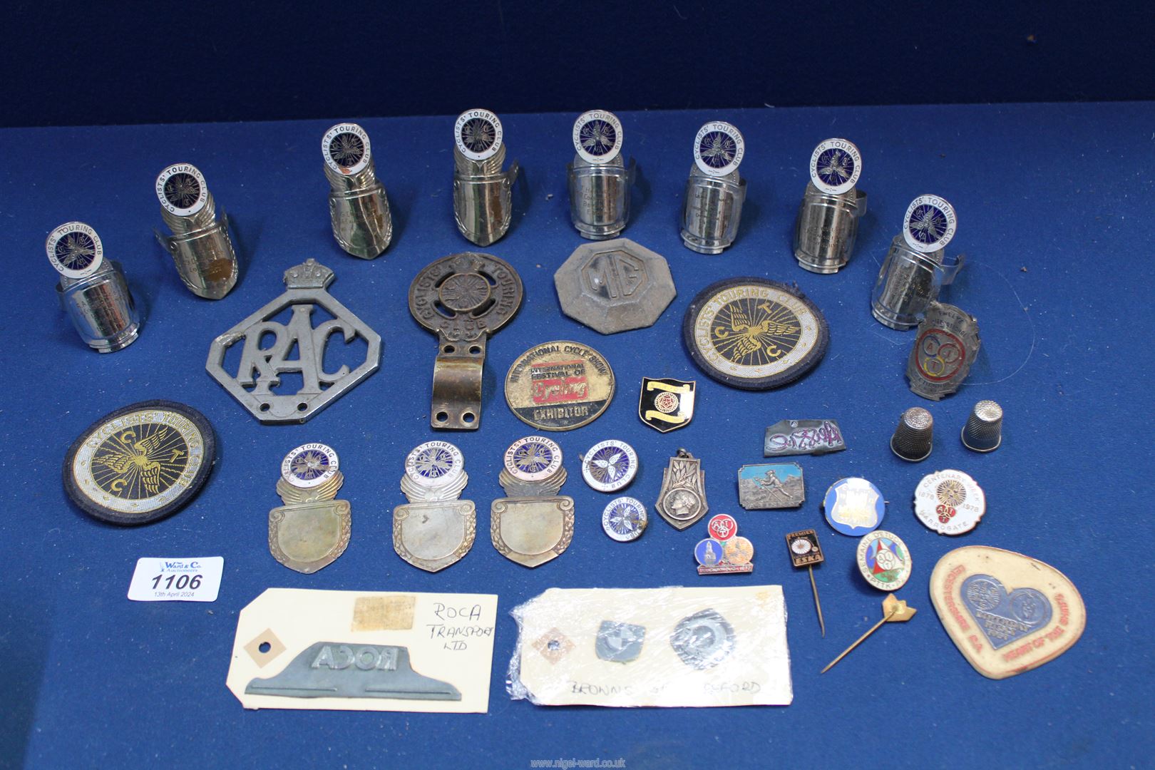 A quantity of cycling club handlebar Badges, badge moulds, RAC and MG car badges.