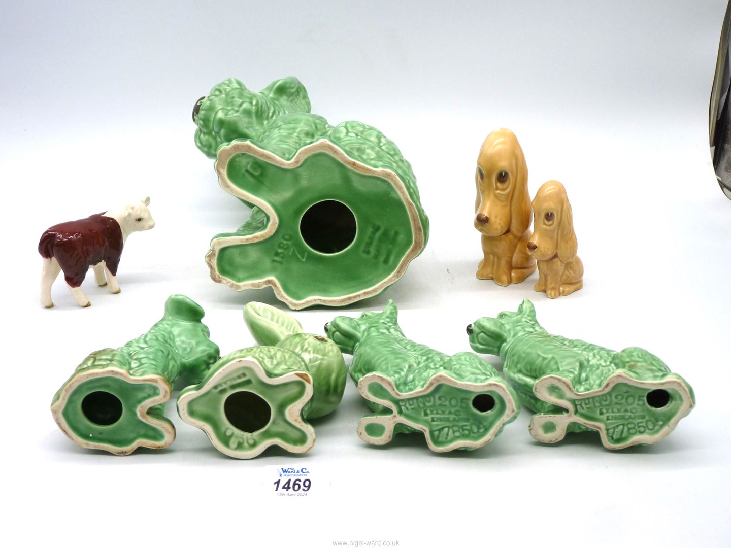 A small quantity of Sylvac dogs plus one rabbit (mostly green), plus a Beswick Hereford calf. - Image 2 of 2