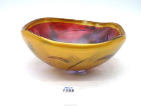 A thick heavy Art Glass bowl in crimson and blue with interior matt finish,