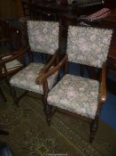 A pair of Oak framed open armed Elbow Chairs having turned front legs and "H" stretchers,