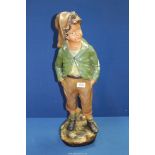 A large slipware figure of a Young boy in breeches, marked OP 260 on reverse, 24 1/2" tall.