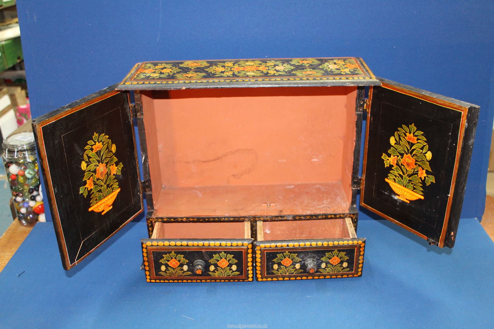 A black cabinet having painted floral decoration with two doors and two drawers, - Image 2 of 3