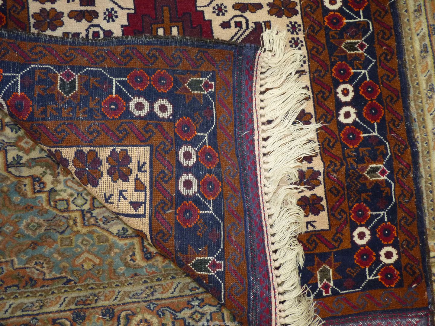 An Afghan Beluch rug in beige, blue and red shades, 69'' x 31 1/2'' including fringe. - Image 3 of 3