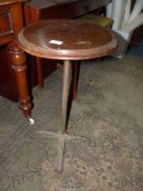 A cast iron based Oak topped occasional Table, 15'' diameter x 26 1/2'' high.