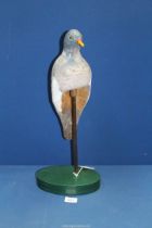 A very unusual and rare "Perching" decoy pigeon on stand with metal support rod.