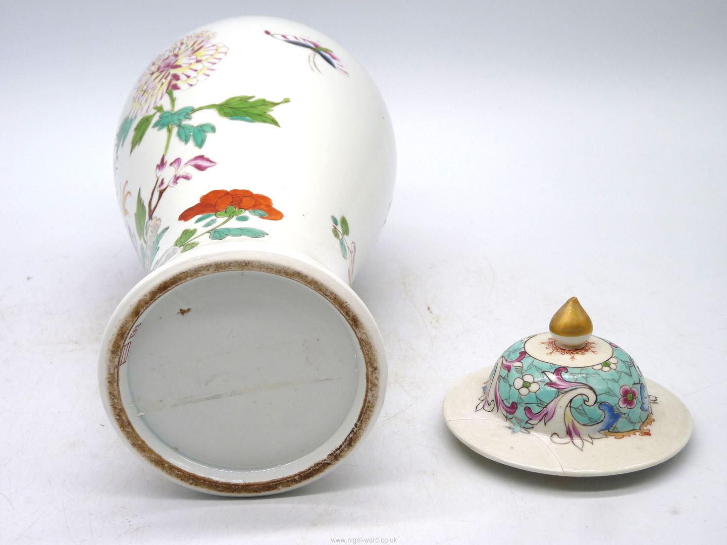 An Oriental lidded vase in colourful floral and bird pattern [mark to base] damage to neck & lid] - Image 2 of 4