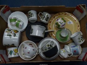 A quantity of china including; Johnson Bros tea ware, Portmeirion vases, Wedgwood plates, etc.