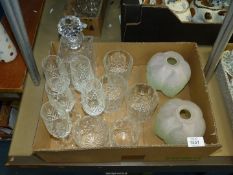 A cut glass Decanter and four glasses plus five Champagne flutes and a pair of frosted glass shades.