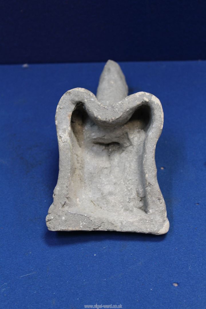 A Roman votive pottery fertility symbol applique in the form of the male genitalia, Imperial period, - Image 2 of 2