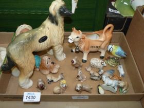 A quantity of ornaments including Coopercraft Afghan Hound, Jersey cow creamer etc.