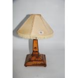 A vintage Treen table lamp with square base and tapering column with palm tree and lake marquetry