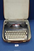An Olympia 'Splendid 66' cased Typewriter.