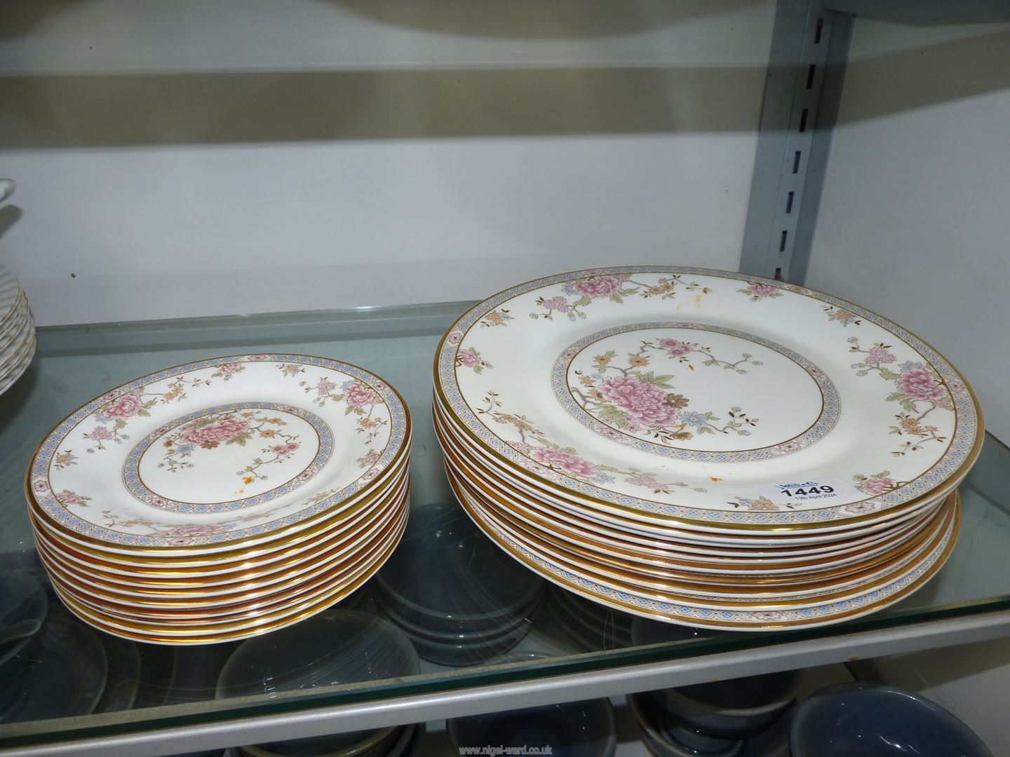Ten each of Royal Doulton "Canton" tea and dinner plates.