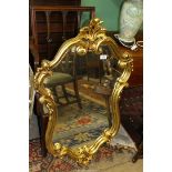 A large modern gilt type finish framed wall hanging mirror, 38 1/2" x 24 1/2" approx.