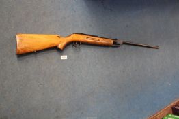 An .177 Air rifle, break action, serial no. 94814, 20 5/8'' barrels, overall length 45''.