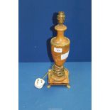 A Marble table lamp with brass detail and stand, 15 1/2" tall.