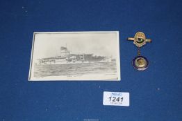 A WWII sweetheart brooch and a postcard featuring 'HMS Glorious' sunk in June 1940 by two pocket