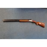 An Italian 12 Bore over and under, selective ejector, single trigger Shotgun,