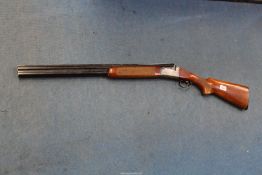 An Italian 12 Bore over and under, selective ejector, single trigger Shotgun,