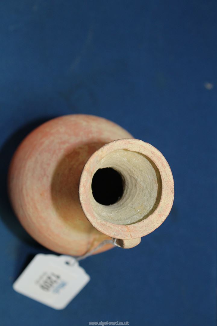 An early redware Roman jug, Republic period, cracks or repairs visible to the rim, 6 1/4'' high. - Image 2 of 3