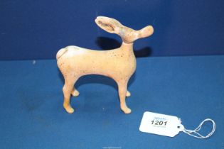 A most unusual Etruscan terracotta perfume bottle in the form of a gazelle, c.