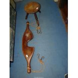 A milking stool and a wooden Yoke, 37 1/2" long.