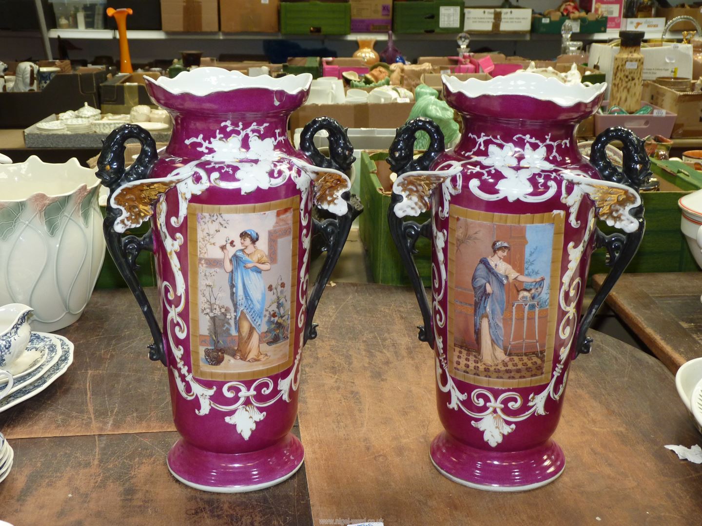 Two large Grecian style vases, 18" tall (one with repair to rim).