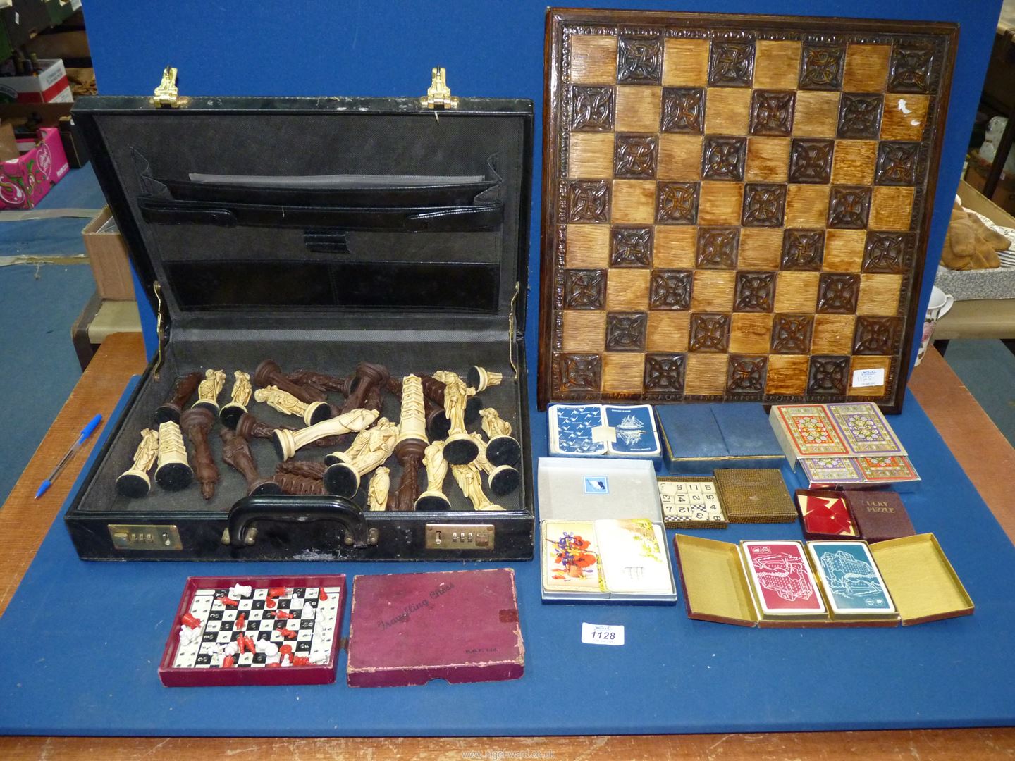 A quantity of games including; Chess board having pottery tiles and pieces (incomplete a/f),