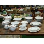 A large quantity of Baden Porcelain Art Deco white china with red/orange and gold banding to
