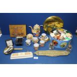 A quantity of miscellanea including a large tin of match books, Oriental part teaset,