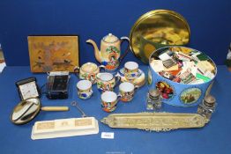 A quantity of miscellanea including a large tin of match books, Oriental part teaset,