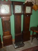 An Oak cased Longcase Clock by Deacon, Barton, the 30 hour movement striking the hours on a bell,