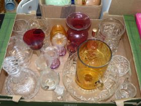 A quantity of clear and coloured glasses including "Sark glass" Cranberry vase, pink Webb vase,