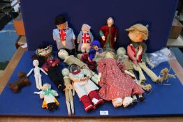 A Collection of dolls including peg dolls, handmade dolls, two American Apple dolls, etc.