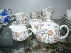 A Minton 'Haddon Hall' coffee set for six plus a breakfast teapot for one.