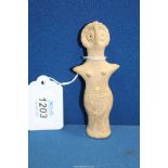 A small Syro-Hittite figurine or early Boeotian terracotta fertility figurine of Astarte with