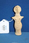 A small Syro-Hittite figurine or early Boeotian terracotta fertility figurine of Astarte with