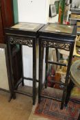 A pair of ebonised Chinoserie Urn Stands/Lamp Tables having inset marble tops,