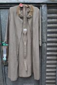 A vintage ladies costume coat and dress with belt by 'Holden' in beige light weight twill fabric,