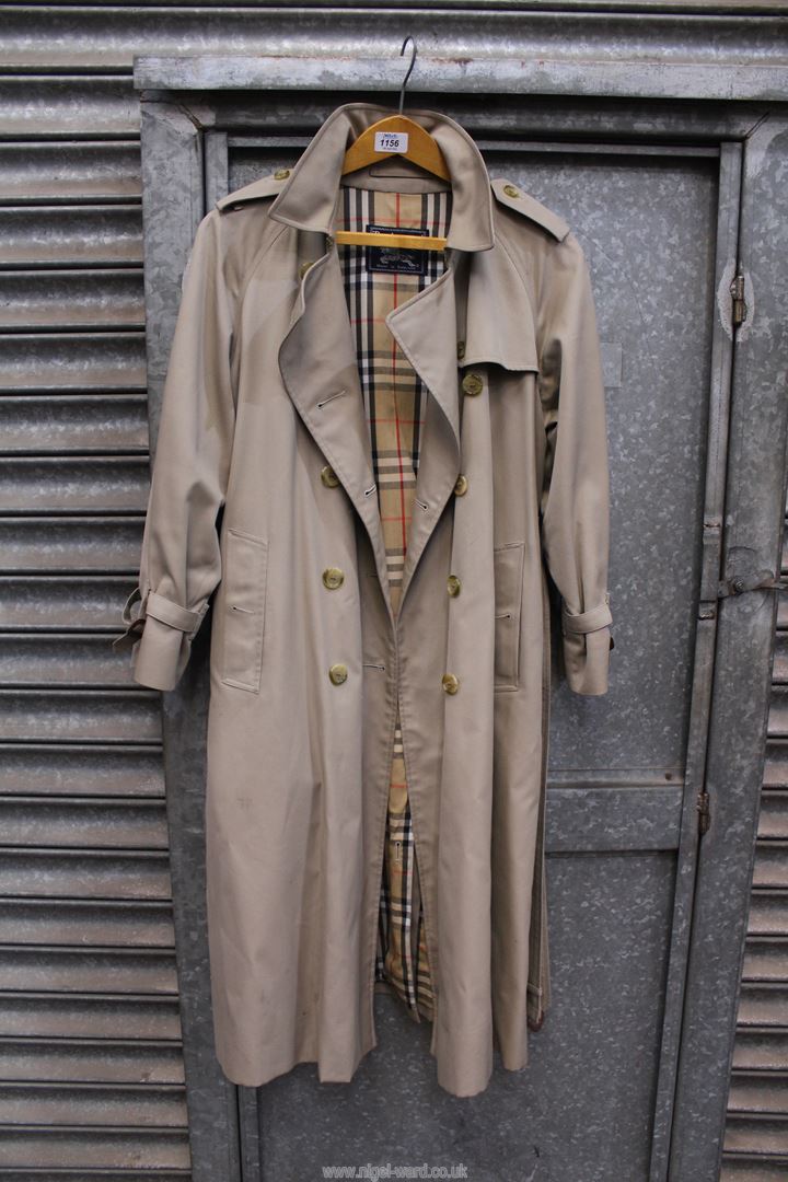 A Gents Burberry Trench Coat.