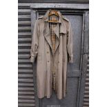 A Gents Burberry Trench Coat.