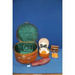 A vanity case with green lining, collar and stud box and contents, Selfridges travel slippers,