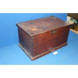 An Oak lidded box having hinges and dovetail joints, (a/f) 16" wide x 10" deep x 9" high.