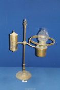 A heavy brass Student Oil lamp with a weighted base, 20" tall.