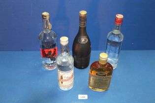 Five bottles of spirits; Reny Martin champagne, Cognac, Napoleon brandy, Polish Vodka, etc.