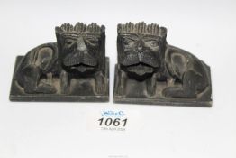 A pair of Chinese slate carvings of Temple dogs, 3" long x 2" tall.