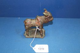 A good Indian 'village' bronze figurine of a saddled Bullock, 19th c.