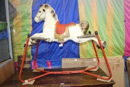 A Mobo Price rocking horse.